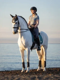 LeMieux Earth Dressage Square Ocean - Large 9 LeMieux Earth Dressage Square Ocean - Large -Lemieux Shop it01417 lifestyleearthdressagepad ocean 12 copy